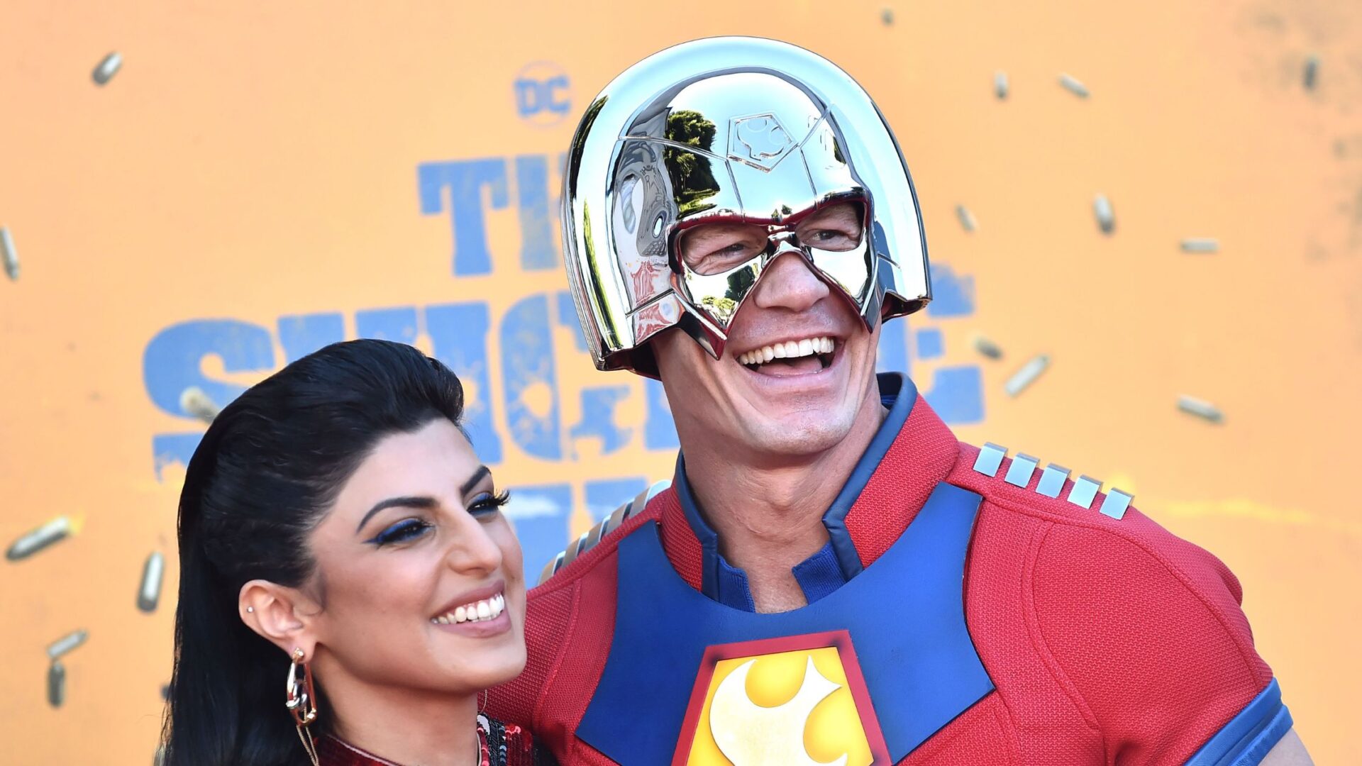 LOS ANGELES - AUG 03: John Cena and Shay Shariatzadeh arrives for the ÔSuicide SquadÕ Hollywood Premiere on August 02, 2021 in Westwood, CA (Dfree/shutterstock.com)