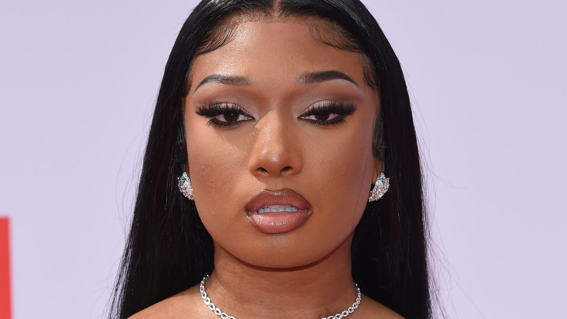 LOS ANGELES - JUN 27: Megan Thee Stallion {Object} arrives for the 2021 BET Awards on June 27, 2021 in Los Angeles, CA (Dfree/Shutterstock)