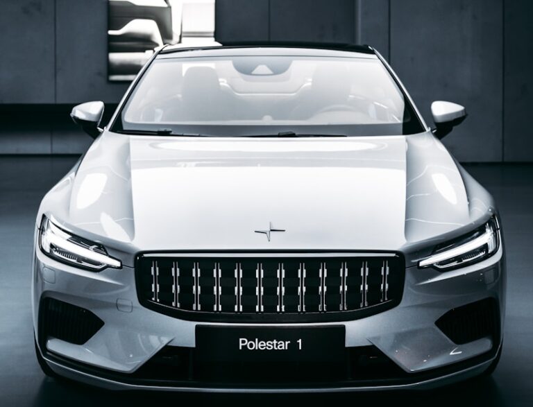 white bmw m 3 coupe parked in garage