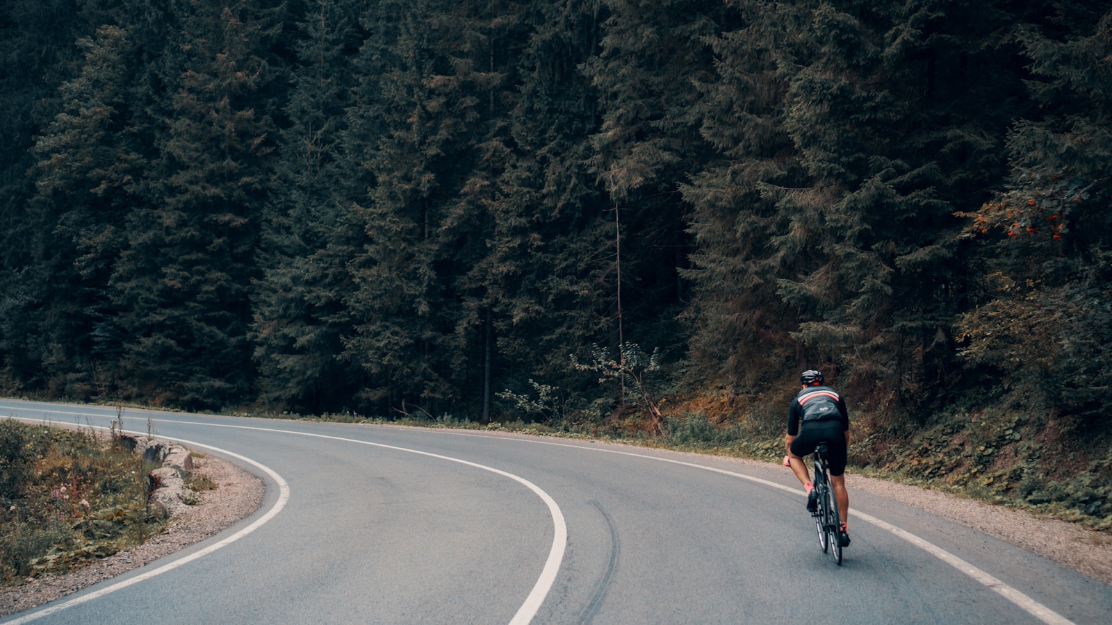 Photo by Viktor Bystrov men's black bike helmet